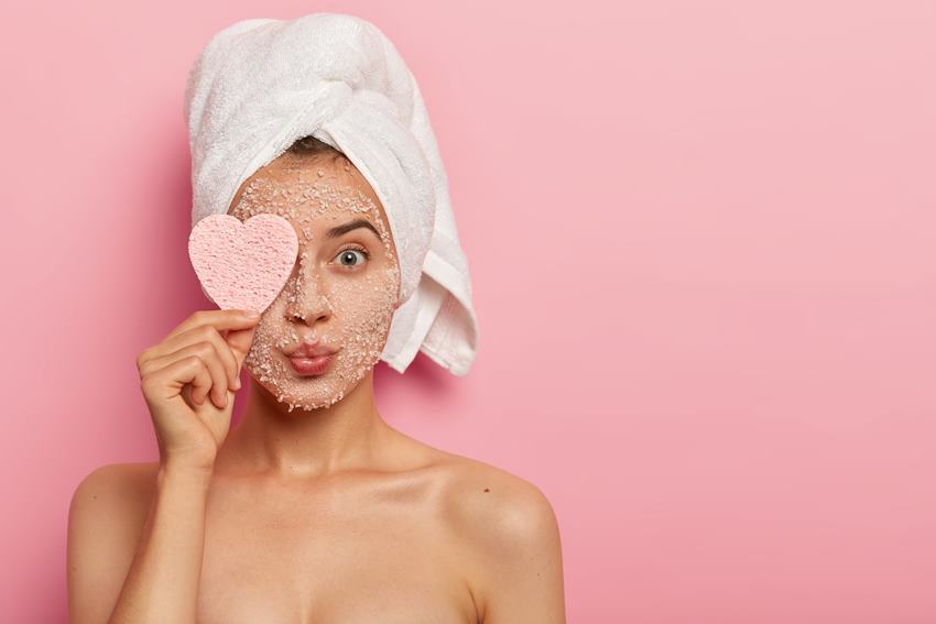 reducing-pores-cleansing-concept-attractive-female-applies-sea-salt-mask-face-has-luxurious-feelings-from-beauty-treatments-covers-eye-with-heart-shaped-sponge-pampers-complexion.jpg